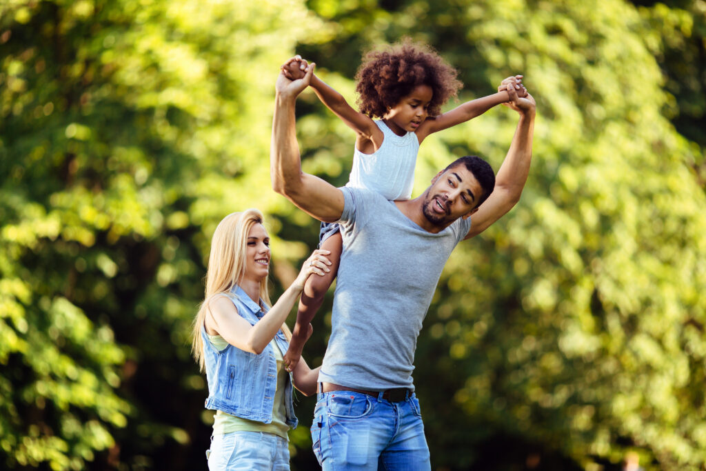 happy young couple with child