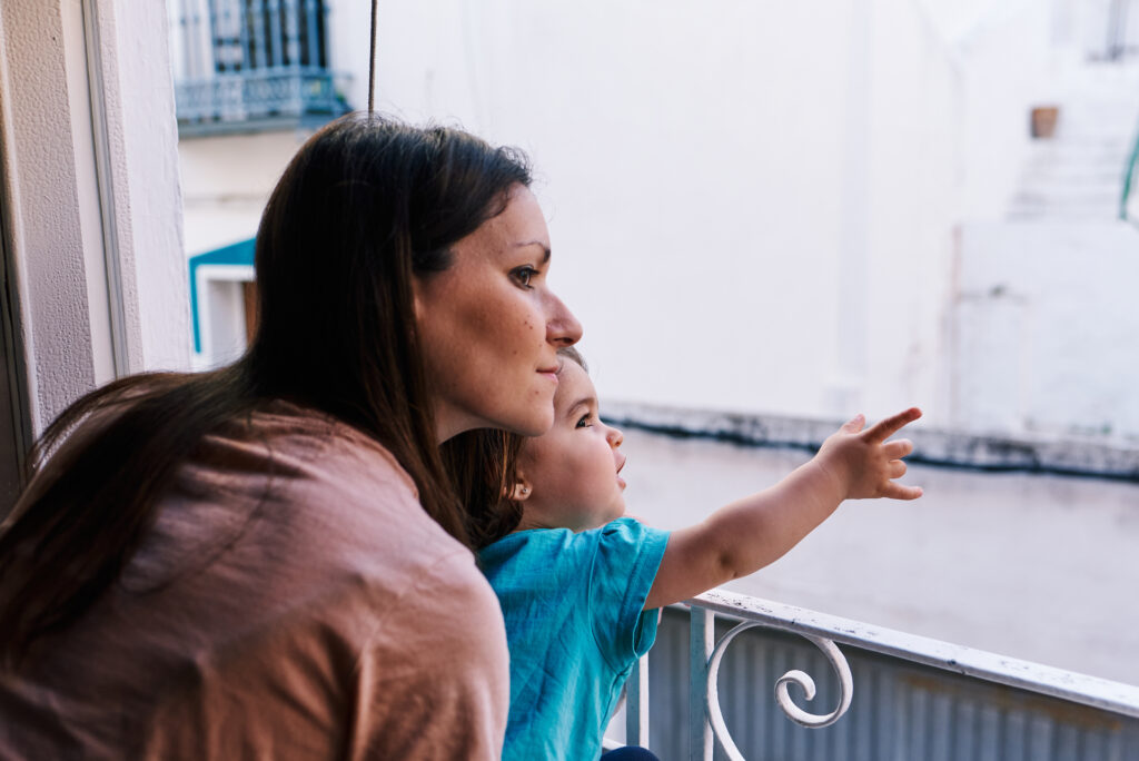 mother saying something to her child