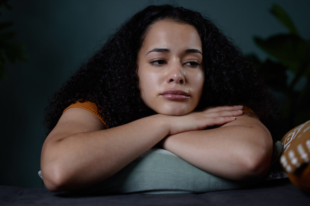 young woman feeling unhappy