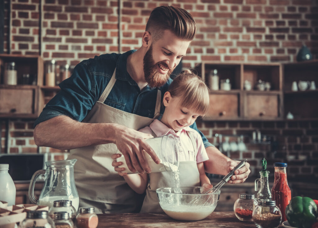 dad and daughter cooking