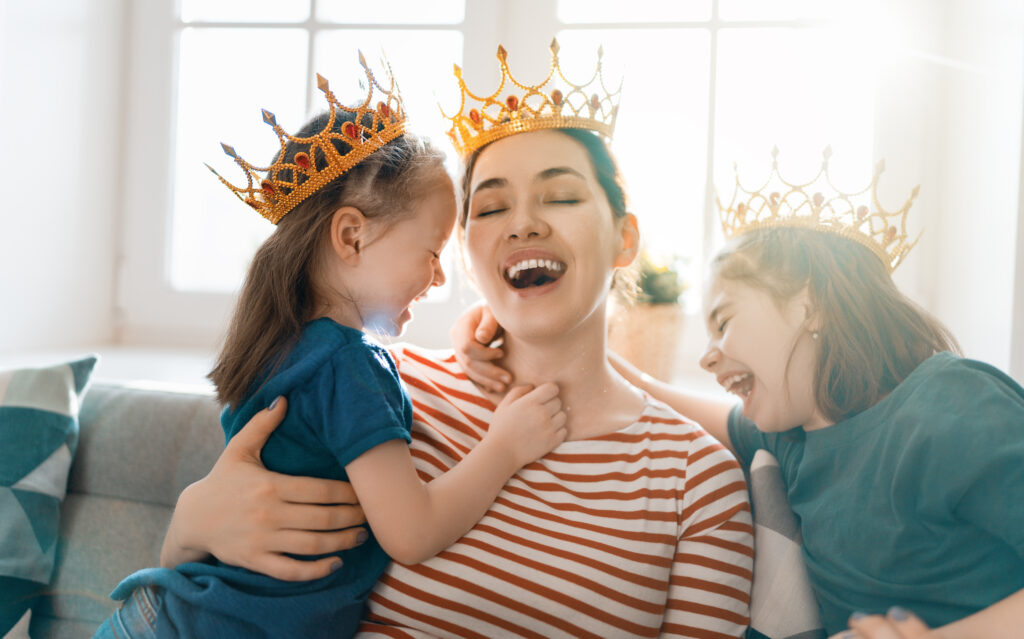 laughing woman and her two daughters