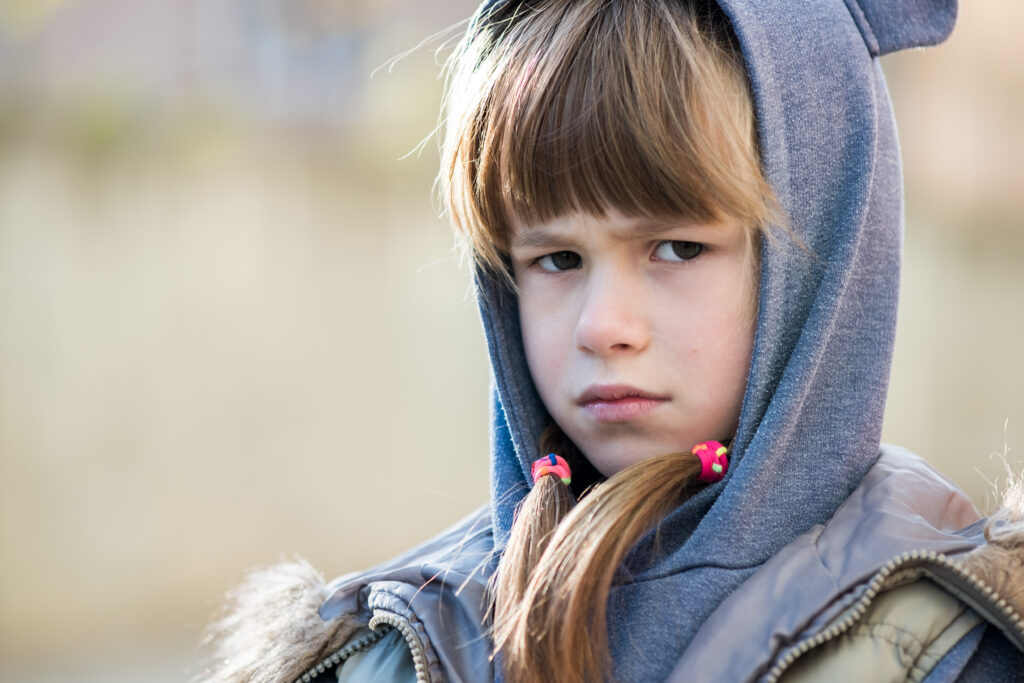 angry looking child girl