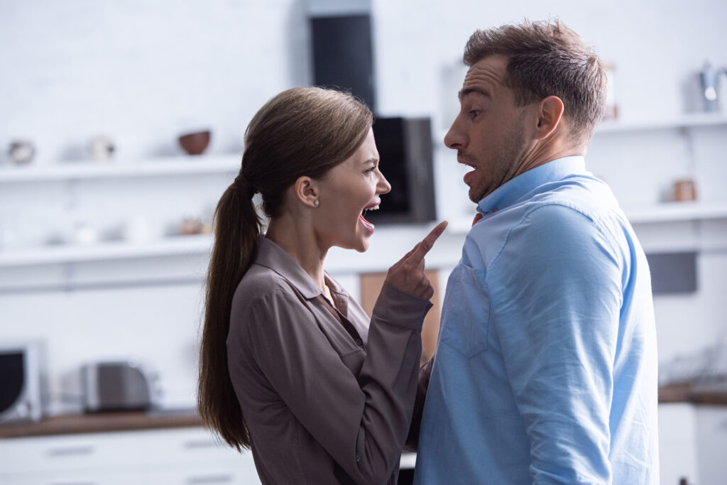 angry woman screaming at husband